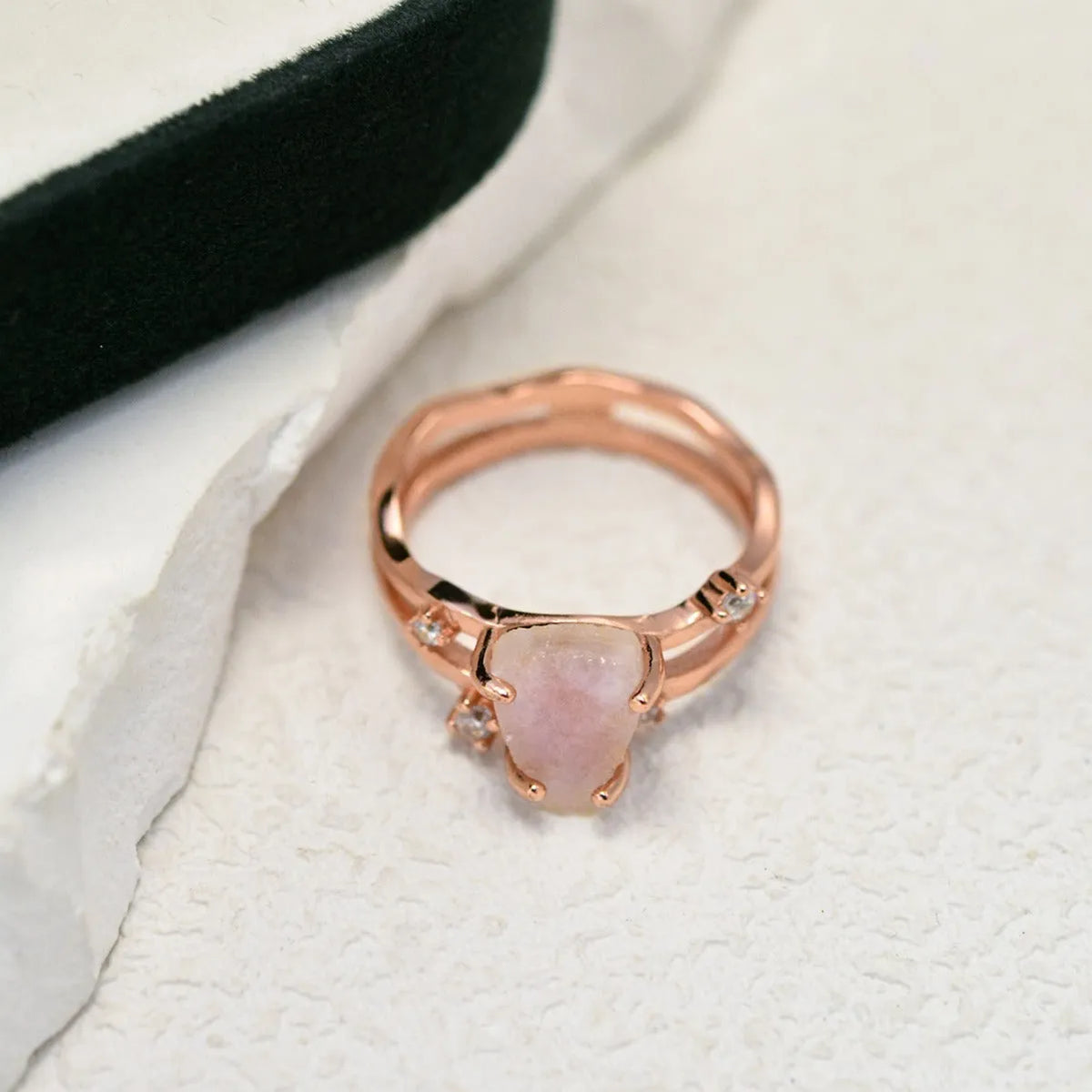 S925 silver irregular triangle moonstone ring in rose gold finish on white background