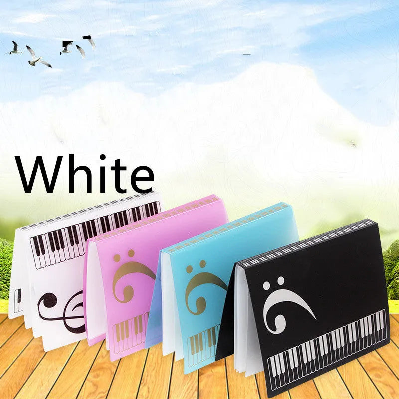 Black piano score folder with transparent plastic pages for holding sheet music.