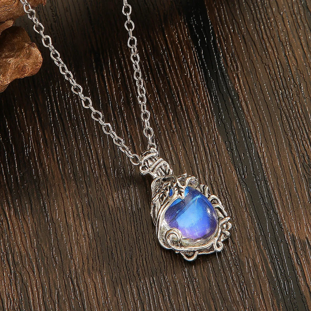 Genuine moonstone pendant necklace on sterling silver chain with polished bezel setting
