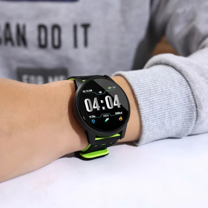 Black smart watch with sport rubber strap and 1.3-inch screen showing step count data.