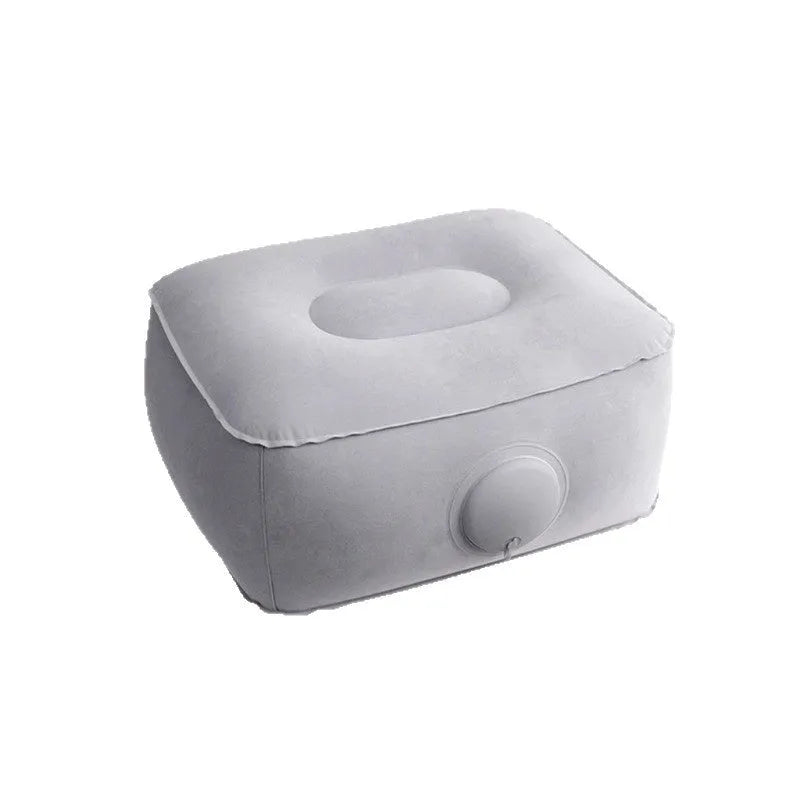 Red portable inflatable seat cushion shown folded and inflated on a wooden bench