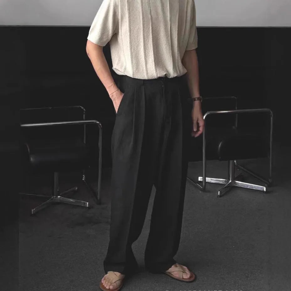 Men's light-weight apricot wide-leg cotton linen trousers with a non-iron finish on a hanger.