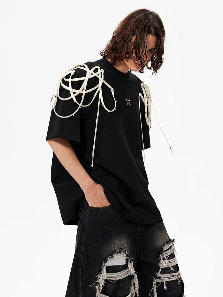 Black loose fit T-shirt with rivet ribbon padded shoulder detailing and short sleeves