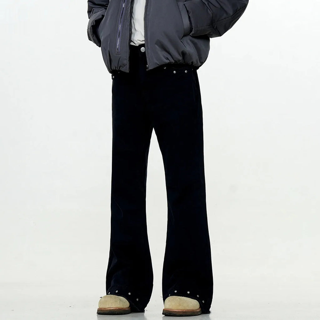 Black American retro straight-leg skinny jeans on a hanger, showing mid-waist and zipper fly detail.