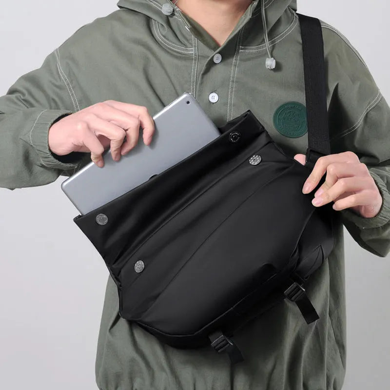 Grey PU crossbody bag for men with zippered main compartment and single shoulder strap