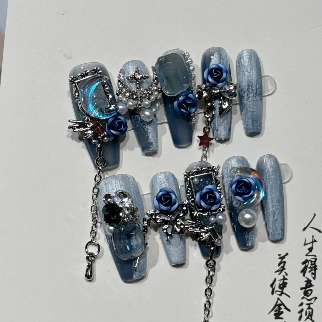 Blue false nails with rose flower pattern for evening manicure in four sizes