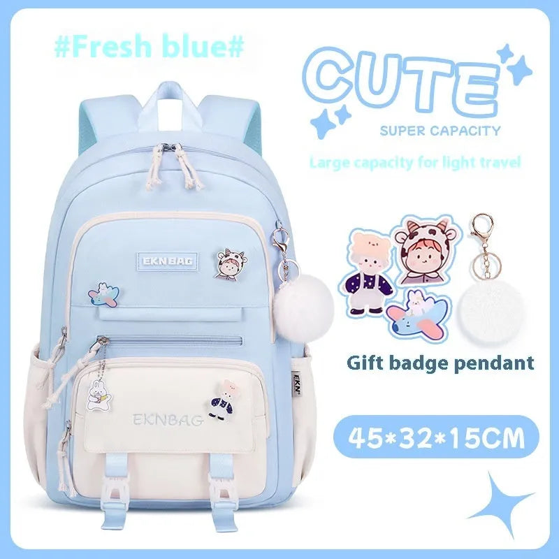 Girls' pink waterproof Oxford cloth school backpack with curved shoulder straps.