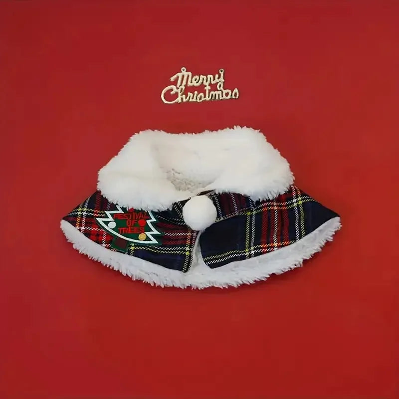 A red festive pet scarf with a bell pattern fastened around a dog's neck with an elastic collar.