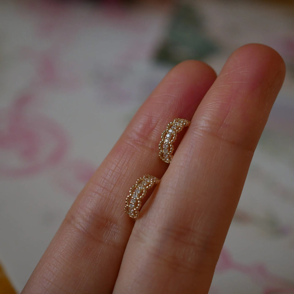 Small gold lace pattern ear clip earrings in 925 silver with electroplated finish