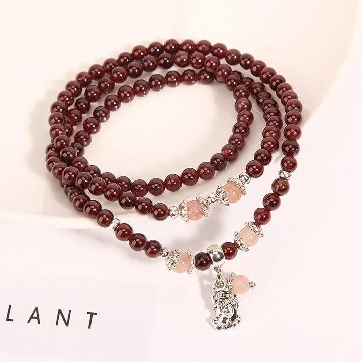 Women's wine red garnet crystal bracelet with floral Bohemian ethnic design