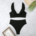 Retro striped split bikini swimsuit in black and white stripes on mannequin