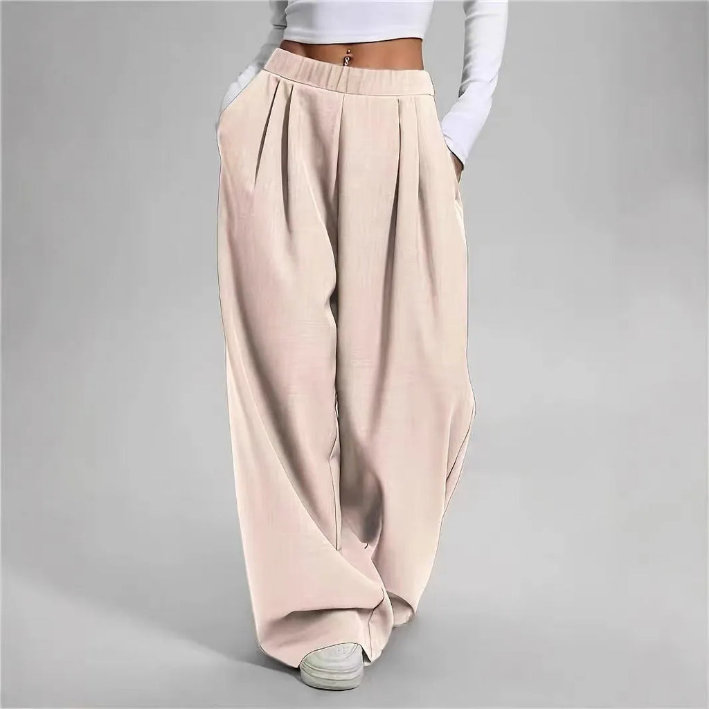 Women's high-waisted loose straight pants with pockets in black polyester fabric