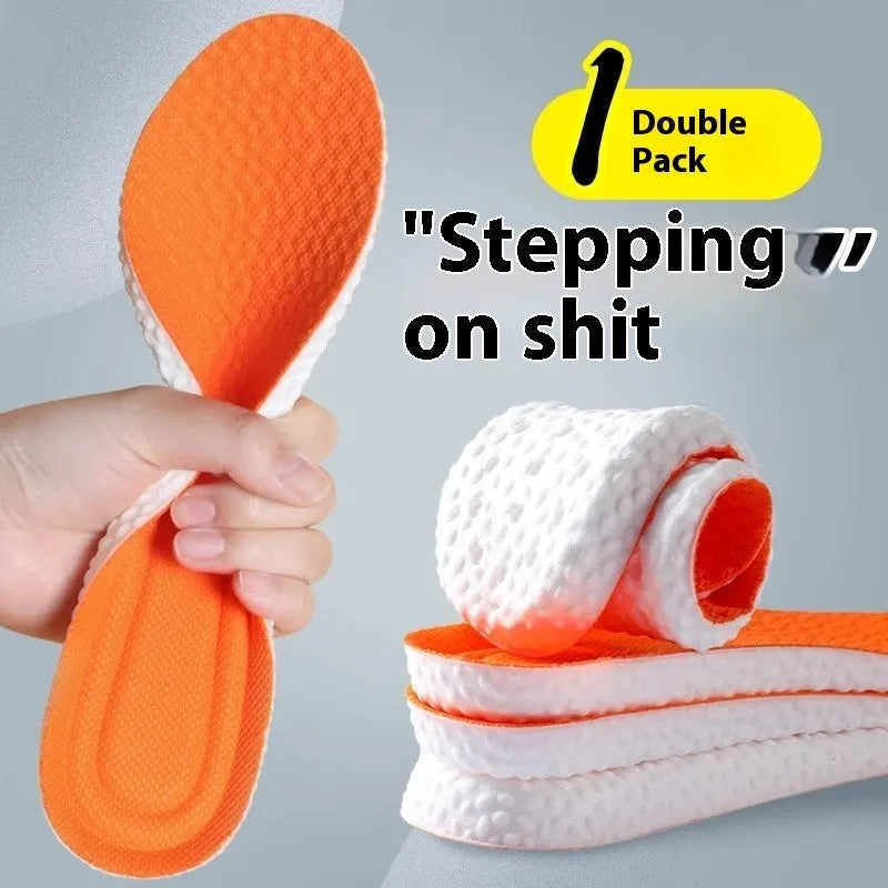 Breathable deodorant sports insoles in grey, black, and orange colours on a white background.