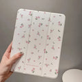 Transparent floral tri-fold protective case for Apple iPad with magnetic stand functionality