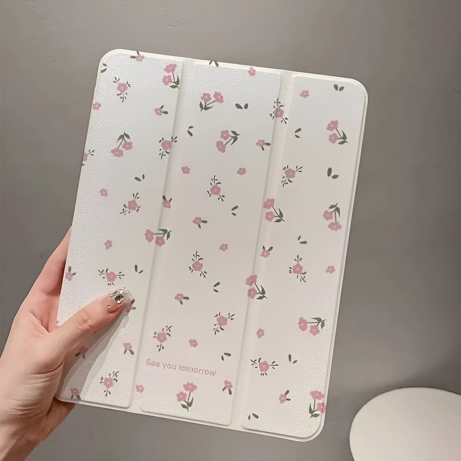 Transparent floral tri-fold protective case for Apple iPad with magnetic stand functionality