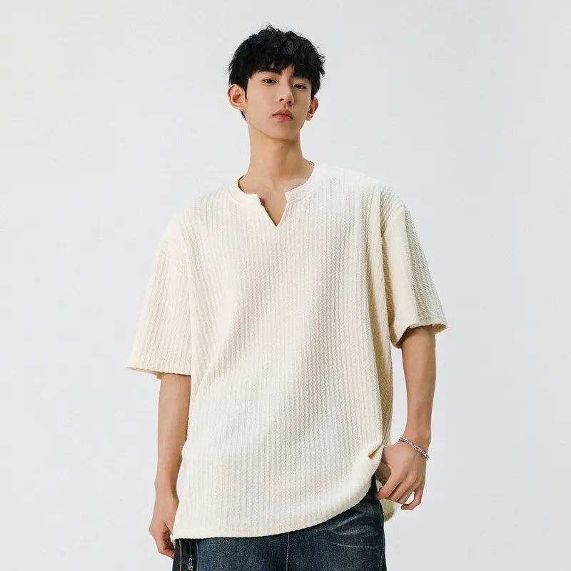 Men's casual loose fit short sleeve V-neck t-shirt in solid beige colour with drop shoulder design