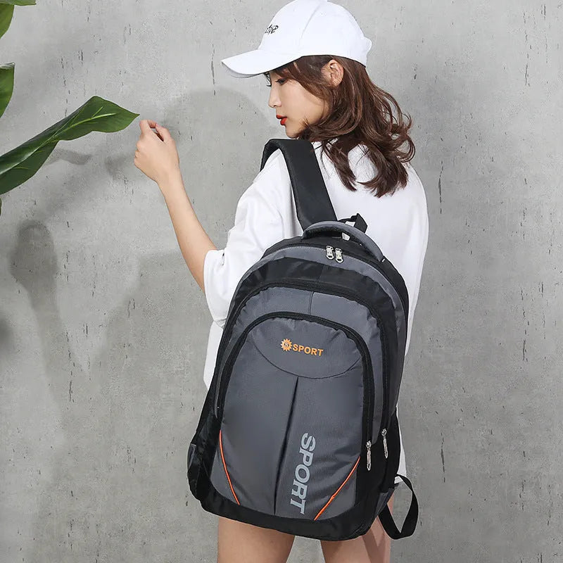 Large capacity men's nylon backpack with curved shoulder straps in black colour showing letter print detail