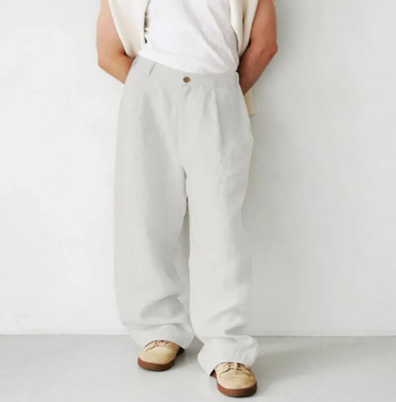 Men's loose high-waist linen jogger pants in a straight-leg cut, shown in a neutral colour.