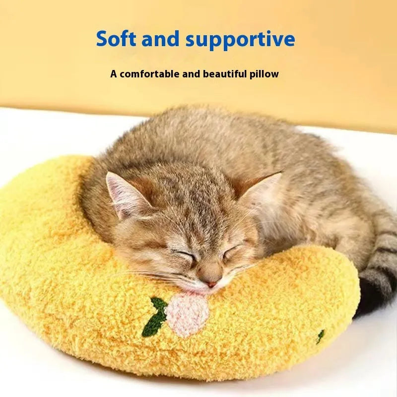 Cat sleeping mat U-shaped pillow in moon and question mark designs on blue, white and yellow cloth