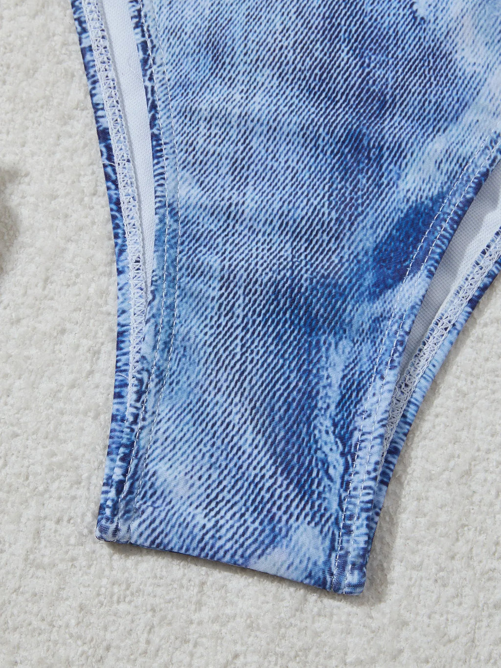 Women's denim blue printed bikini set with strappy design, two-piece swimwear for beach and pool