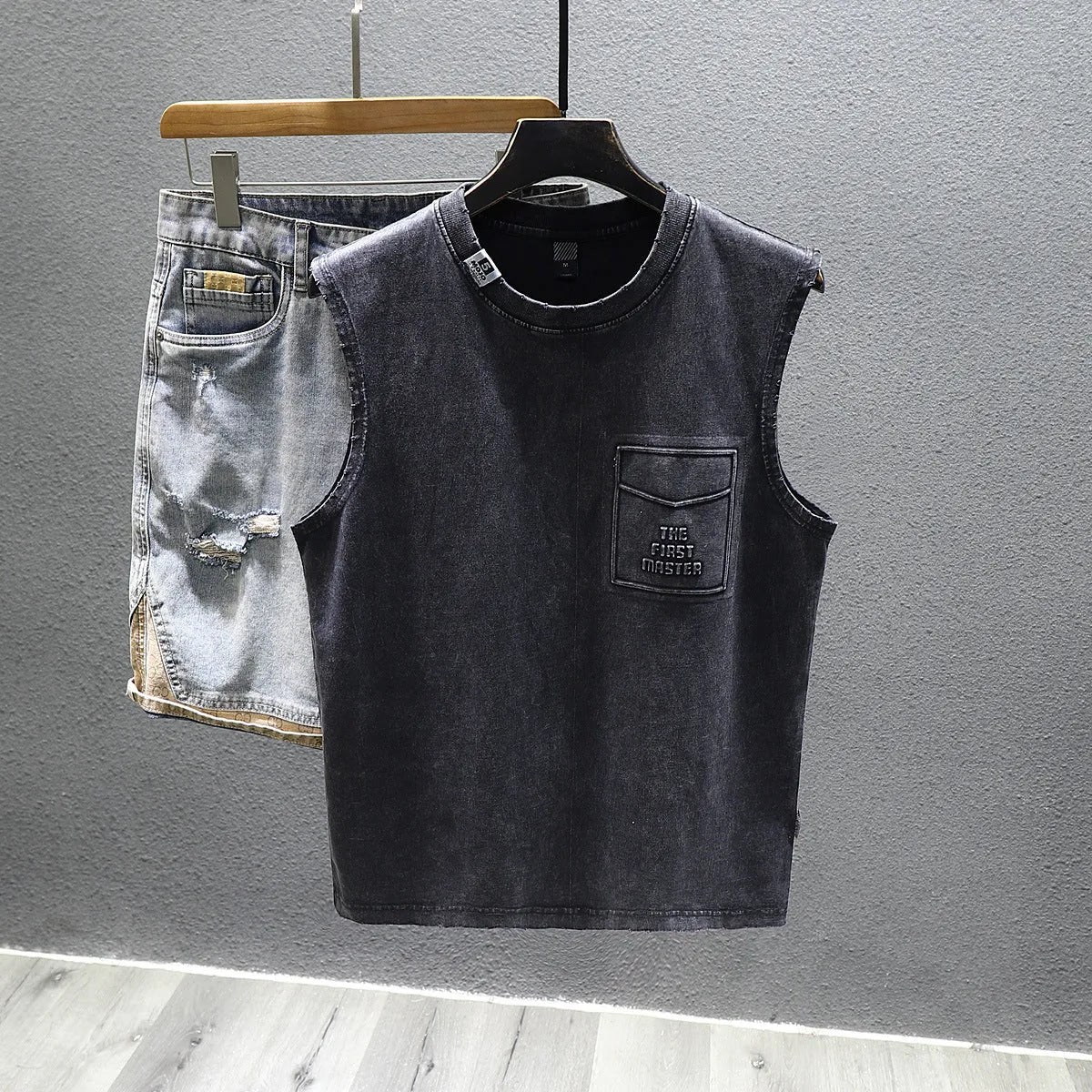 Men's solid colour cotton sleeveless t-shirt with loose fit design in black and white options