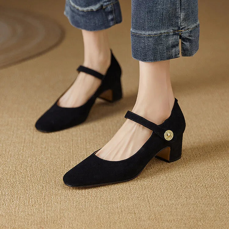 Women's black suede Mary Jane shoes with chunky heel and square toe bracket on white background