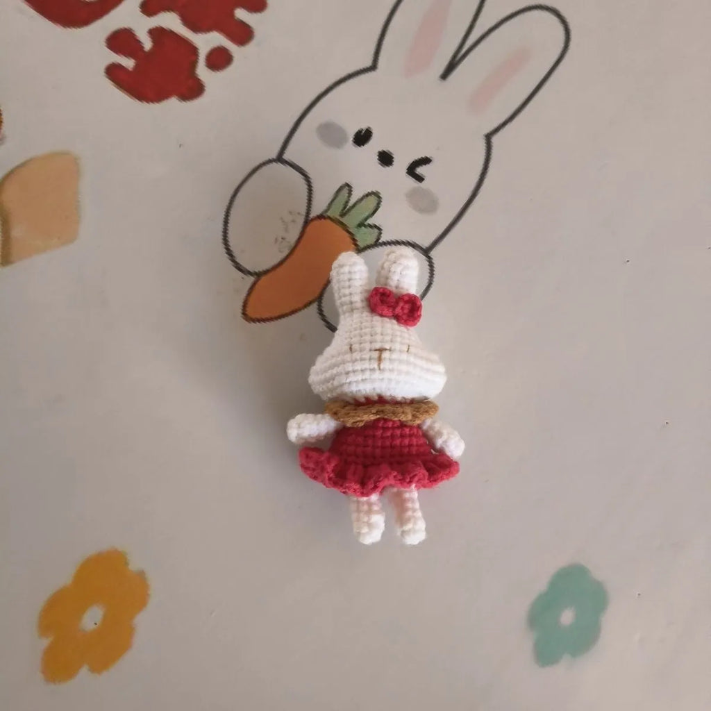 Hand-crocheted wool rabbit key chain pendant in amigurumi style