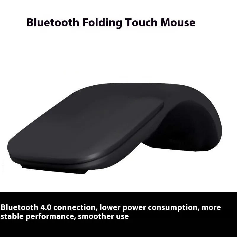 Black folding Bluetooth wireless mouse shown both folded and unfolded beside laptop