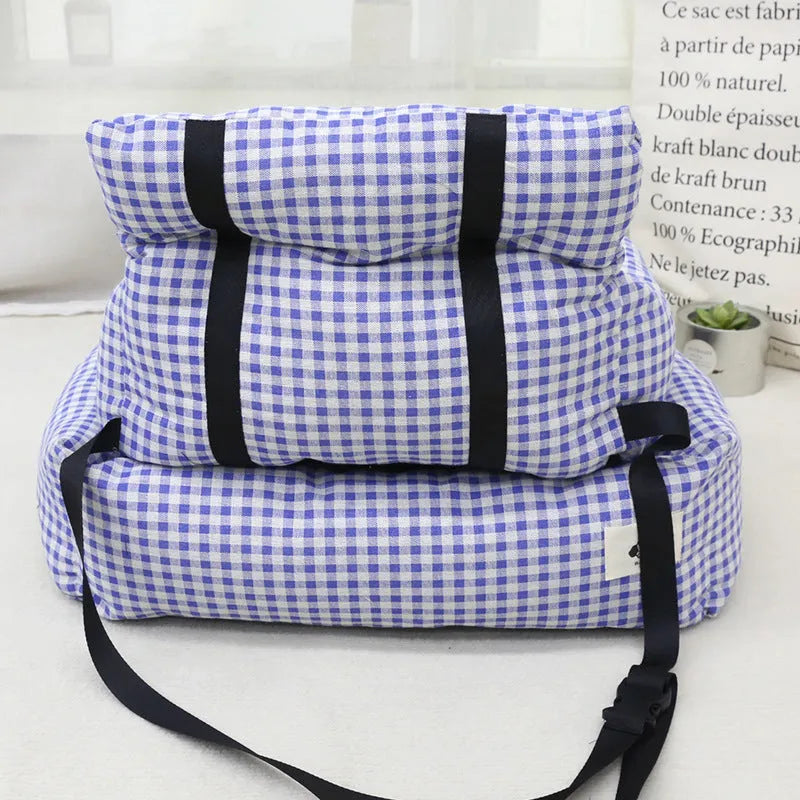 Grey and blue plaid cloth dog carrier baskets designed for mounting in a car, shown in small and large sizes.