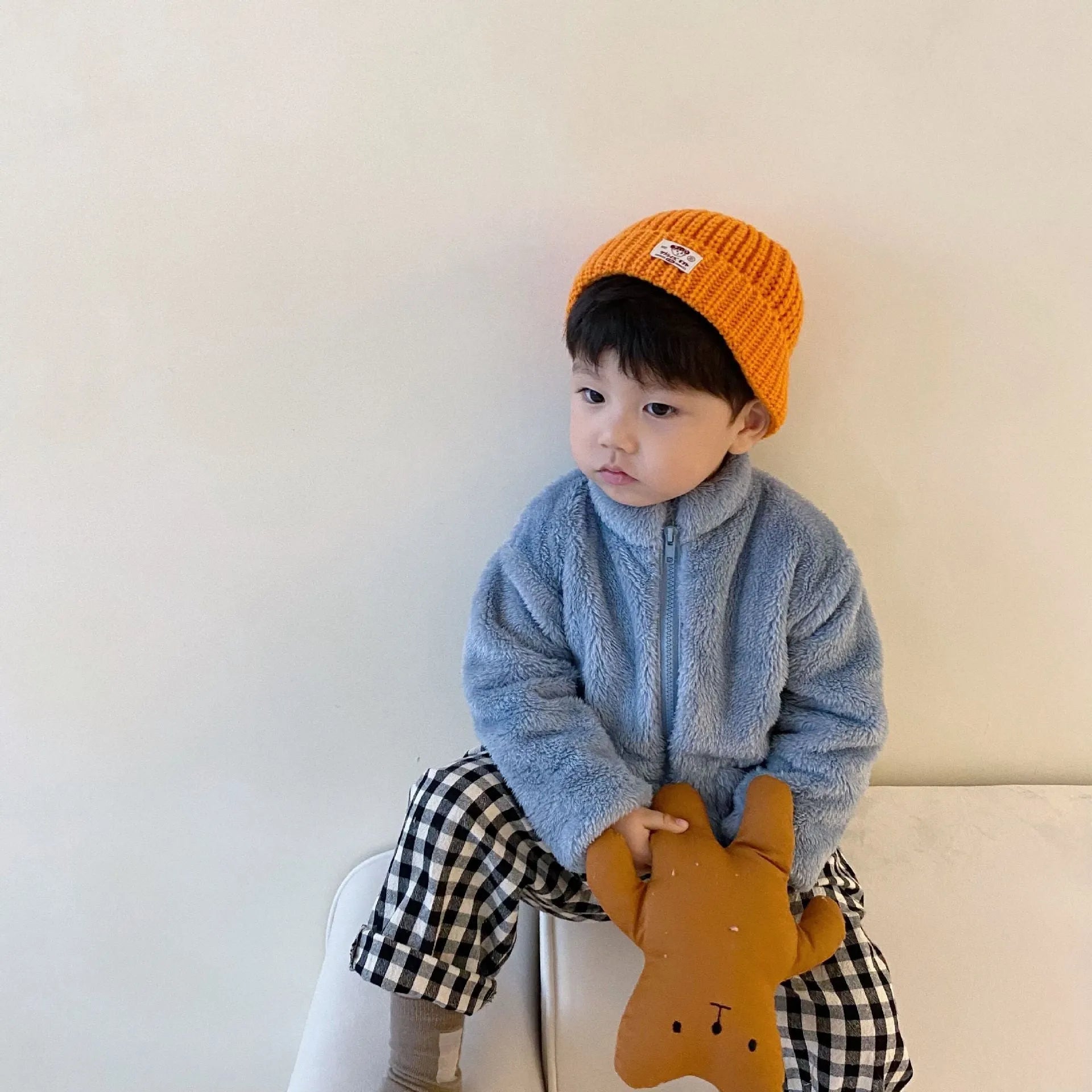 Kids sherpa fleece winter coat with full-zip front, standing collar, and elastic cuffs in solid colours