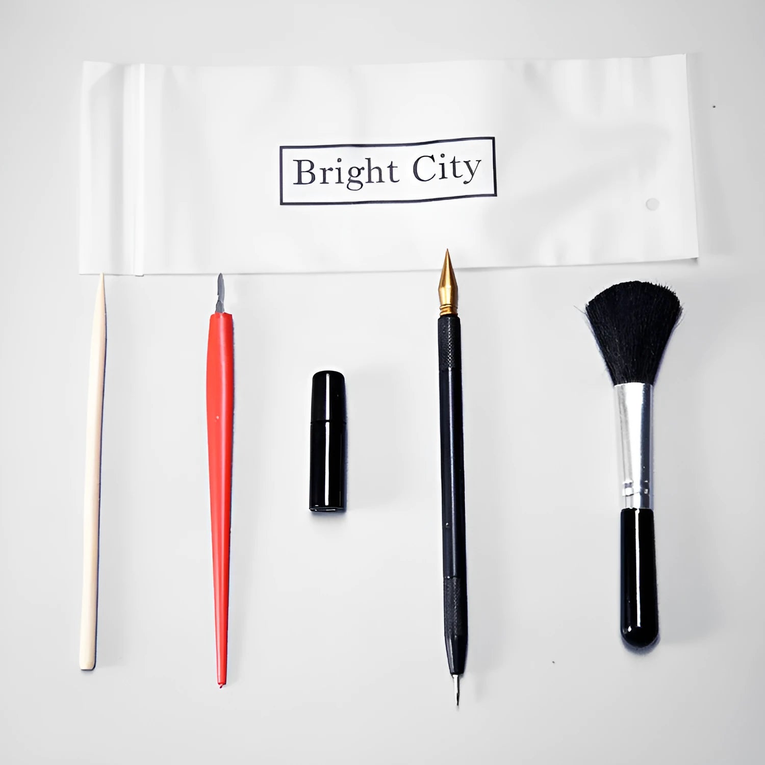 Scratch painting tools kit showing healing pen models, scrapers, brushes, and photo frames for creative art projects