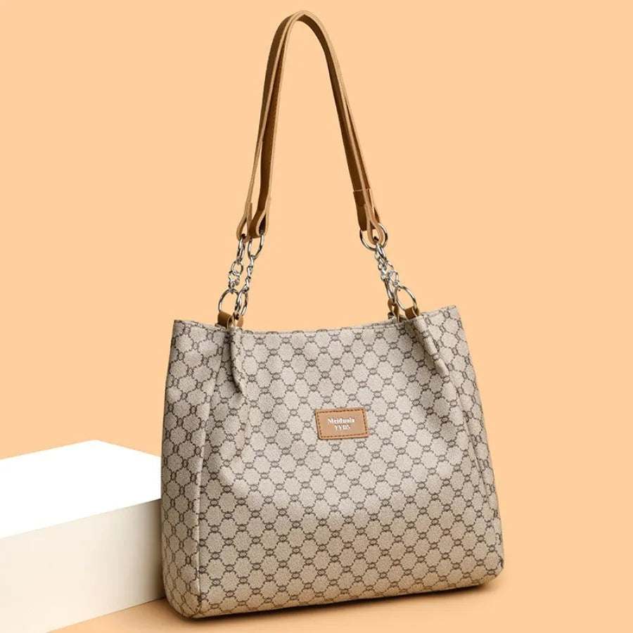 Women's retro style handbag in soft PU leather with polyester lining, shown in brown colour