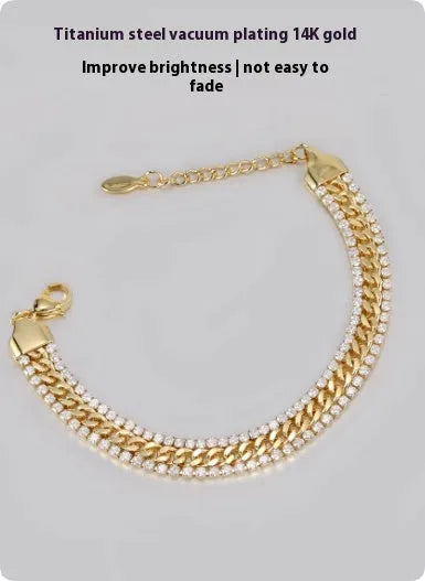 Gold titanium steel hip hop style tennis bracelet with artificial gemstone inlays for men and women.