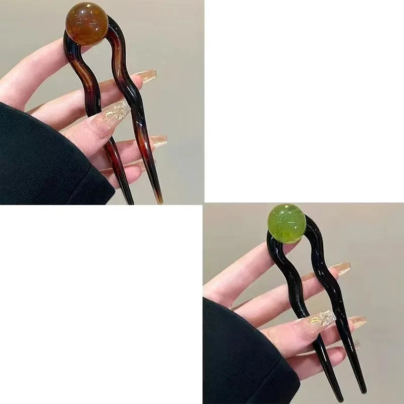 Simple U-shaped acrylic barrettes with ball retro design in beige, caramel, dark gray and green colours