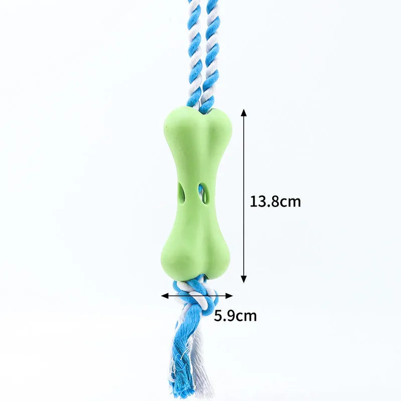 Green porous bone-shaped dog toy with rope knot texture and slots for beef strips or cheese treats