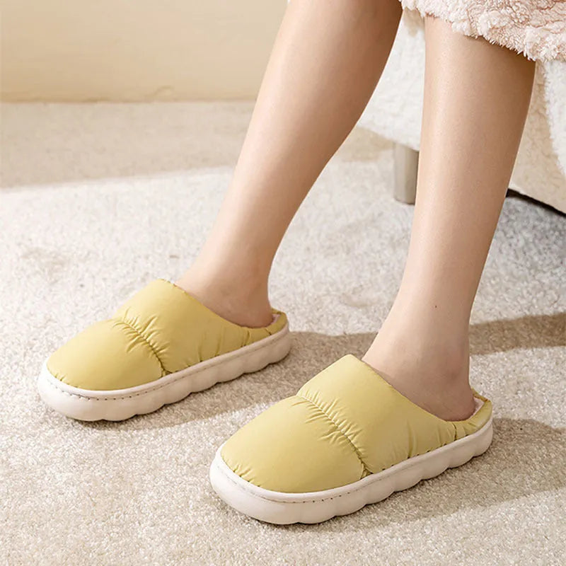 Winter indoor slippers with artificial leather upper, rubber anti-slip sole, and plush lining