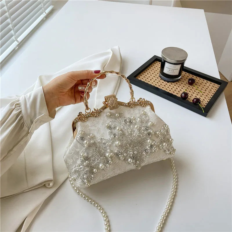 Pearl embroidered soft polyester handbag with double shoulder straps in floating light-white colour