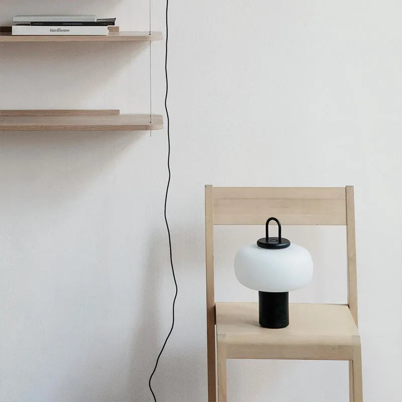 Minimalist clear glass bedside table lamp for children's bedroom with warm glow and UK plug.