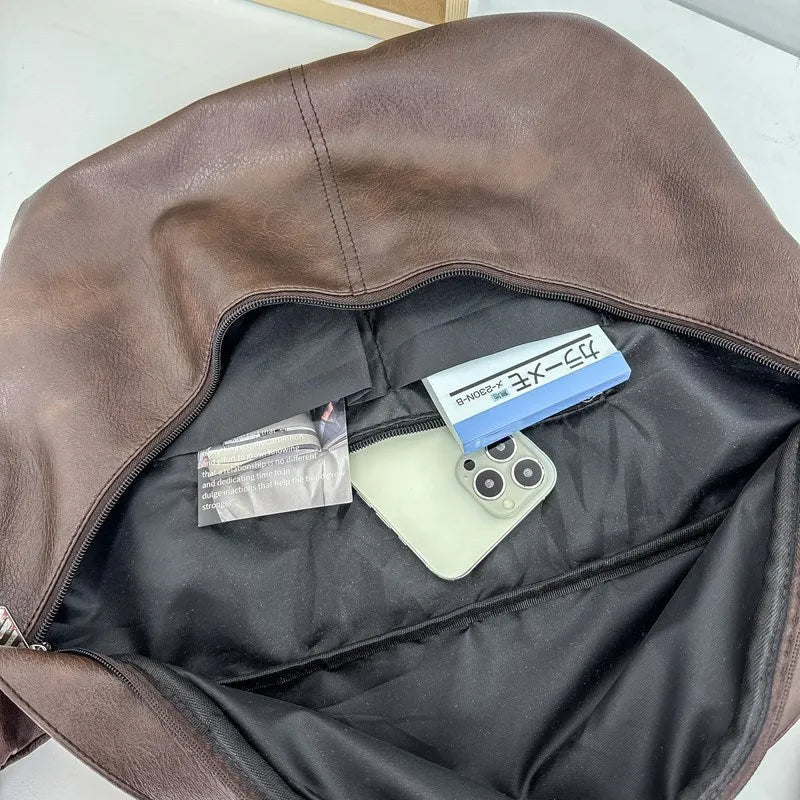 Men's brown retro crossbody bag showing 50cm width and PU leather construction