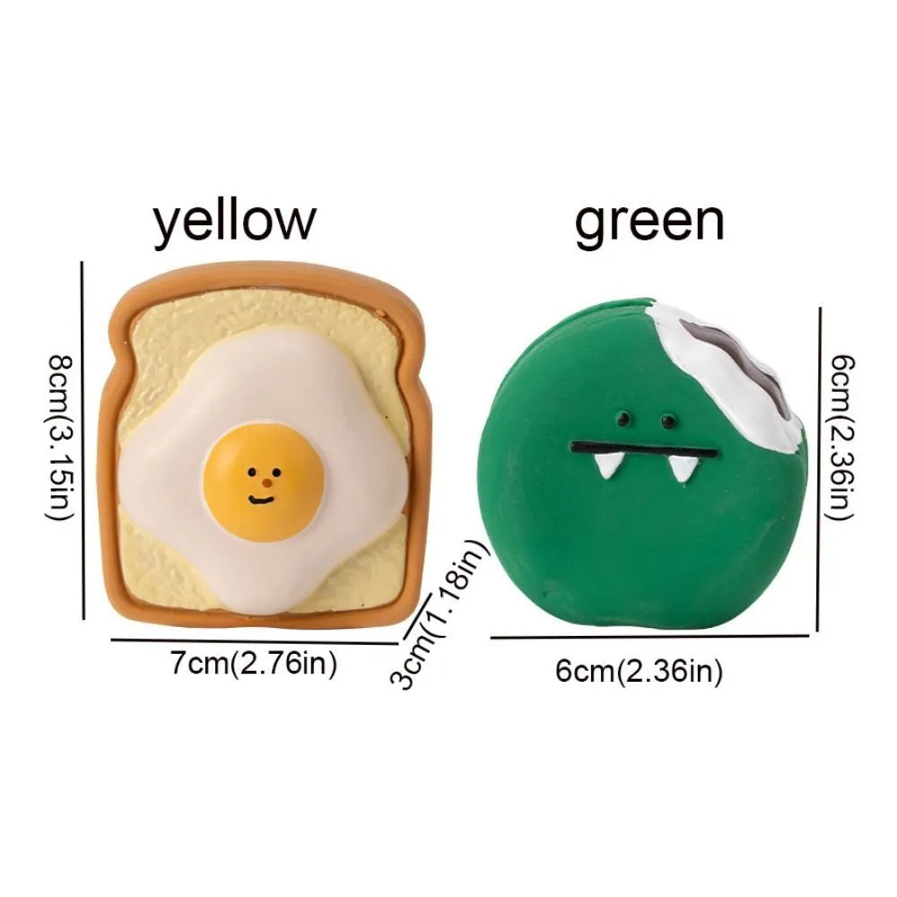 Green and yellow egg-shaped latex dog toy with cartoon bread pattern and squeaker