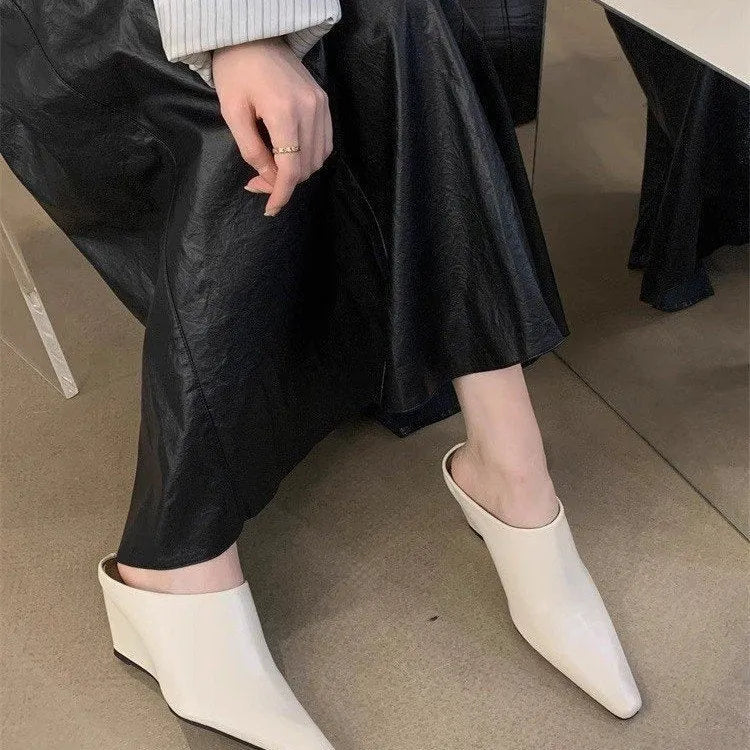 Women's Wind Wedge closed toe half slippers in PU with wedge sole, shown in black, brown, and off white colour options