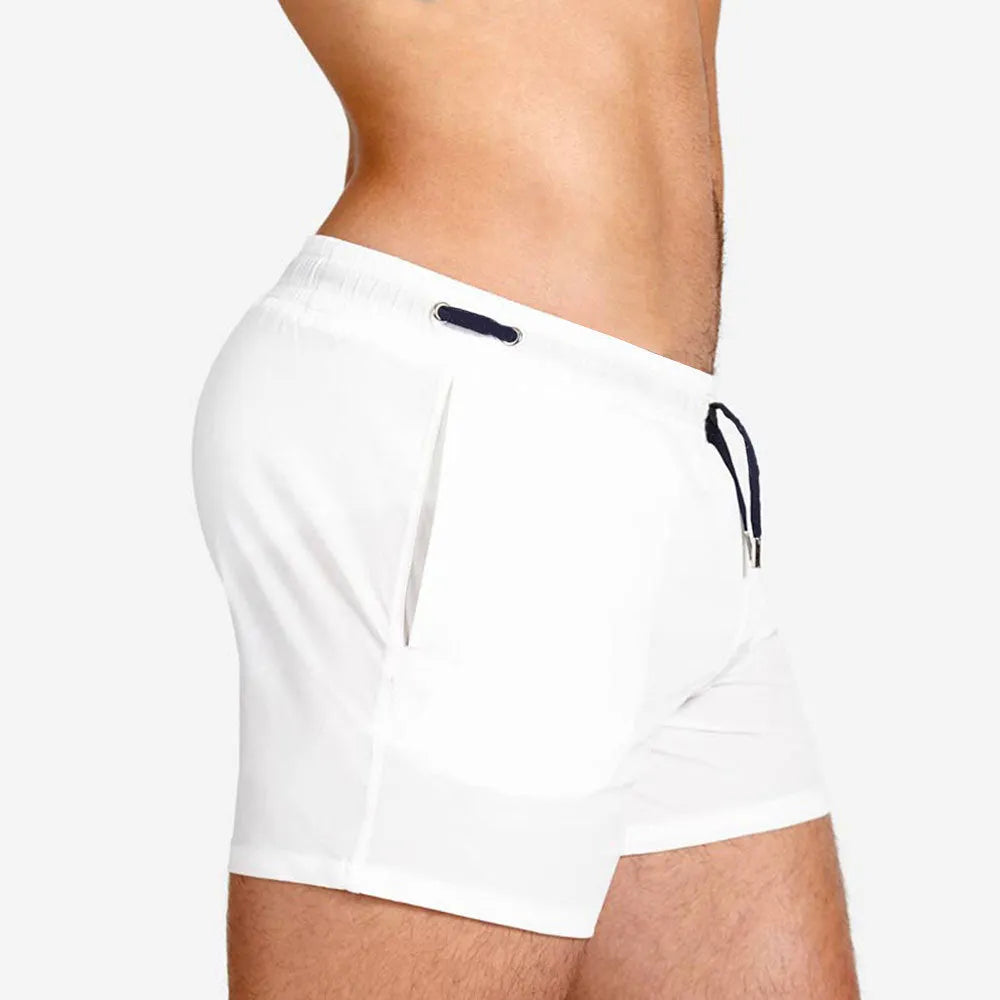Mesh lining swimming sports shorts in polyester fabric showing solid colour options