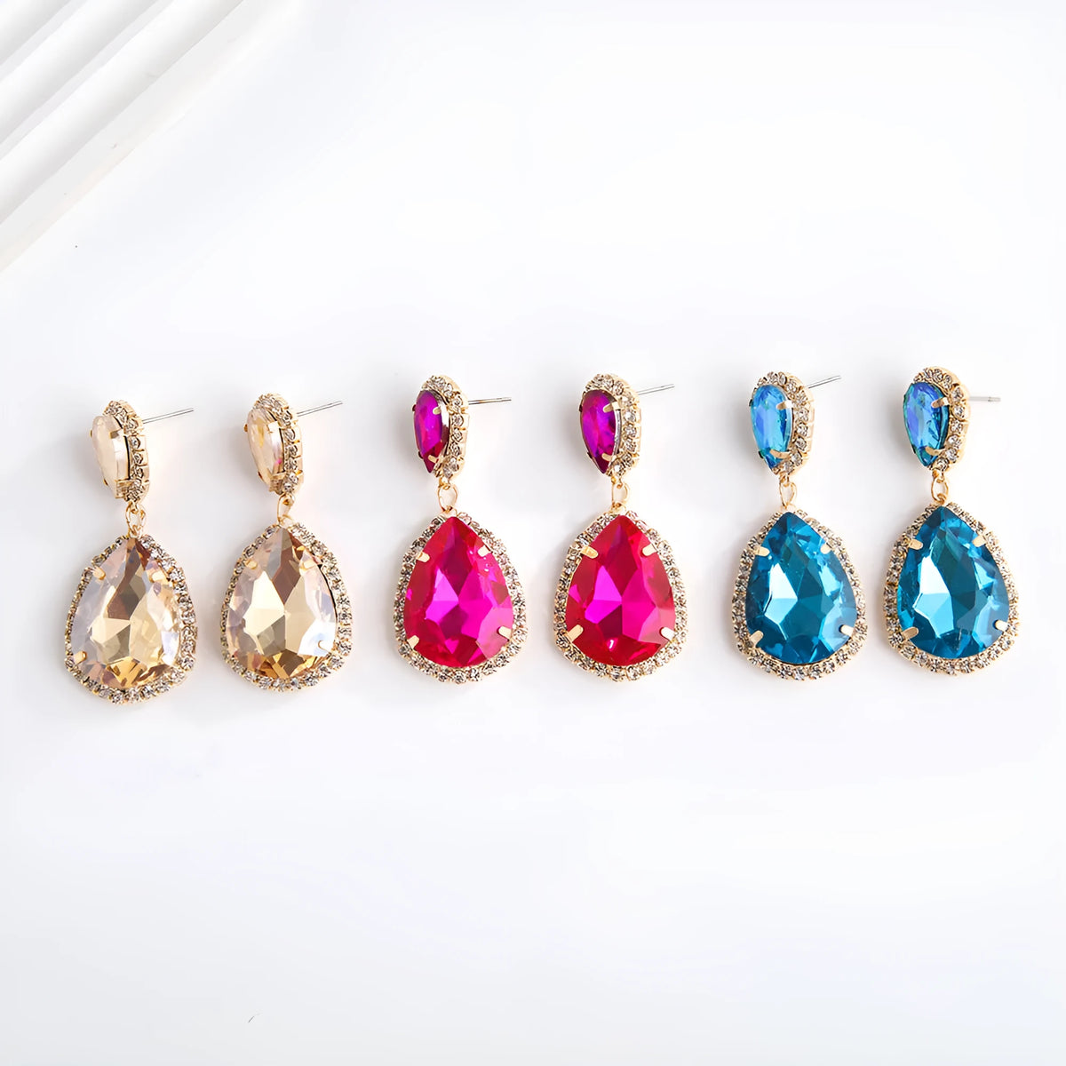 Multi-layer drop-shaped glass rhinestone earrings for women, electroplated metal alloy, available in Rose Red, champagne, and Blue