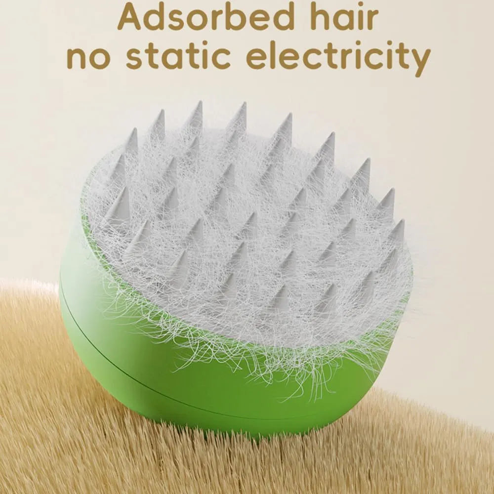 Green and yellow rechargeable silicone cat steam brush for grooming, shown with ergonomic handle.
