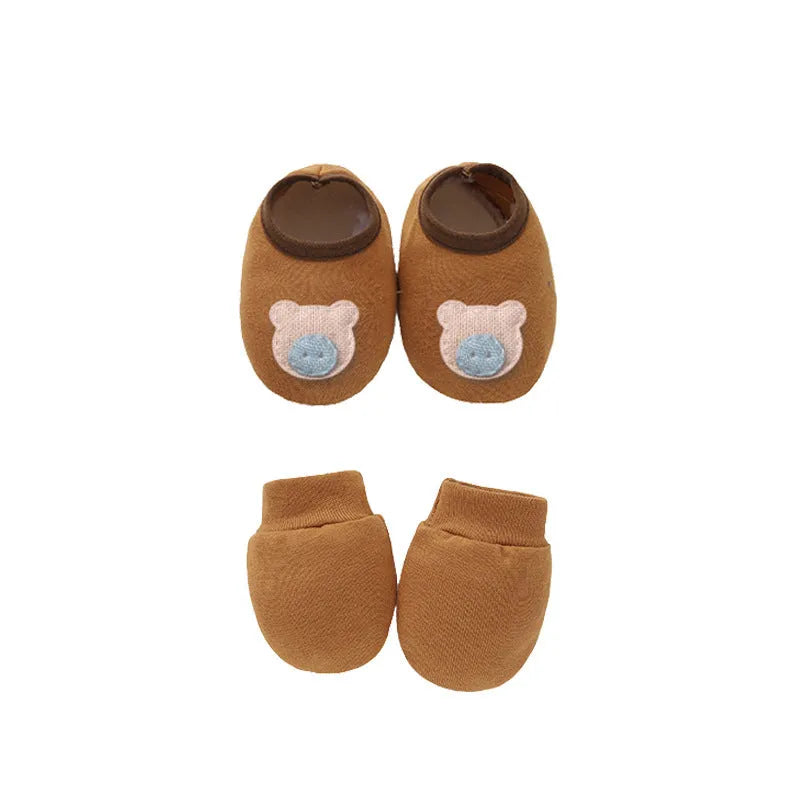 Cotton baby gloves and foot cover set in multiple colours including light blue, navy blue, pink, and camel