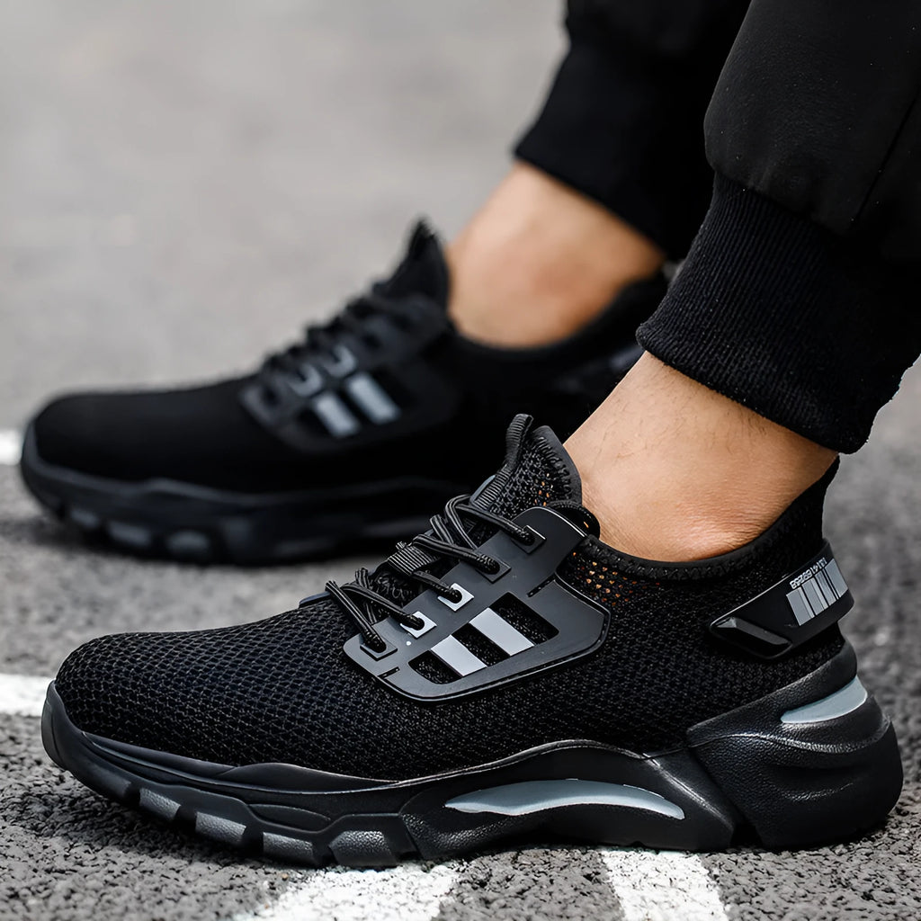 Men's low-top Flyknit safety work shoes in black, featuring a steel toe cap.