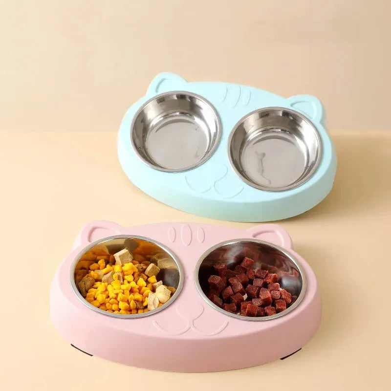 Blue macaron-shaped plastic pet feeder tray with two bowls for cat or dog food and water.