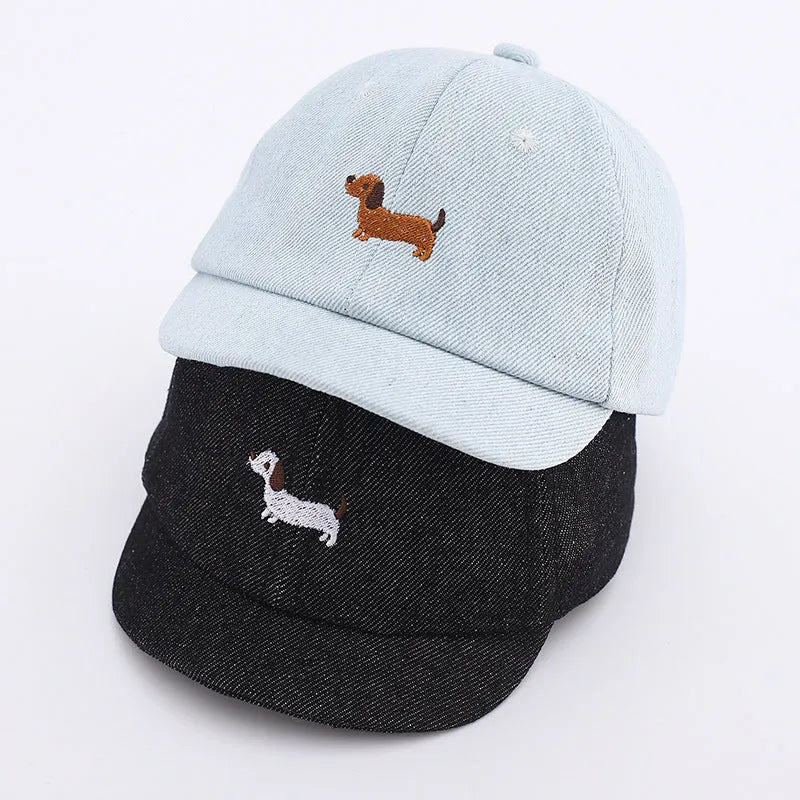 Denim puppy baseball cap for babies with 48cm head circumference in light blue