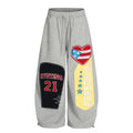 Men's letter pattern cotton loose casual trousers in blue, front view, mid waist design