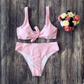 European style women's bikini swimwear set in solid colours with sleeveless design